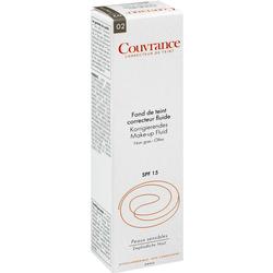 Weiße Verpackung eines korrigierenden Make-up Fluids mit SPF 15.